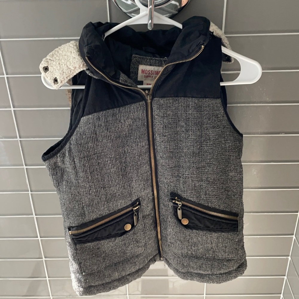 Winter black and white vest with pockets